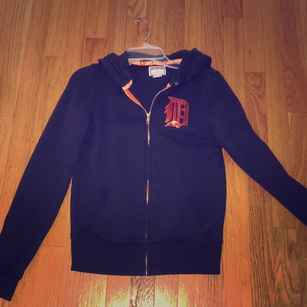 This is a zip up sweater from Pink.